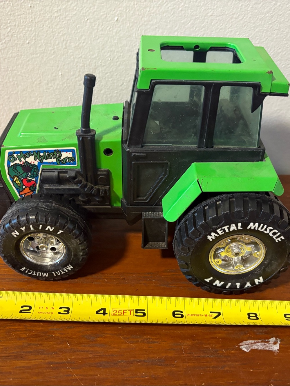 Green Stamped Steel Farm Tractor Ol' Mac Nylint’s Farm